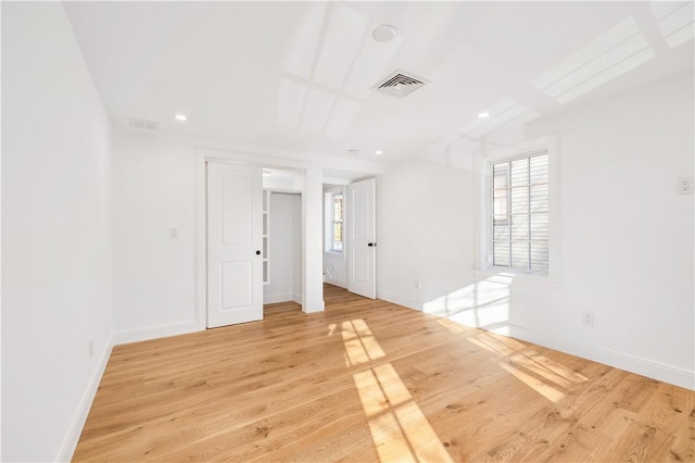 unfurnished room featuring recessed lighting, visible vents, baseboards, and light wood-style flooring