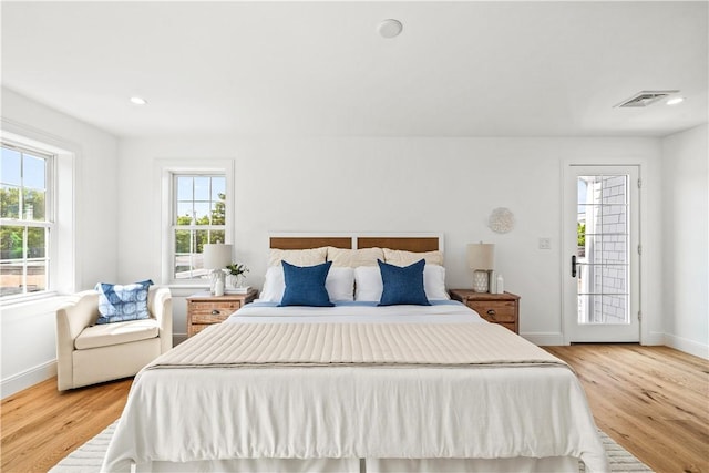 bedroom with visible vents, baseboards, recessed lighting, access to outside, and light wood-type flooring