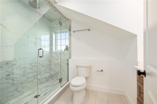 full bathroom with tile patterned floors, a marble finish shower, baseboards, and toilet