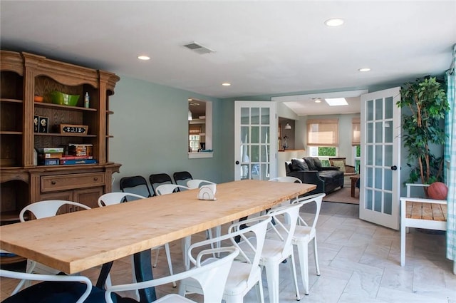 dining room featuring visible vents, recessed lighting, and french doors