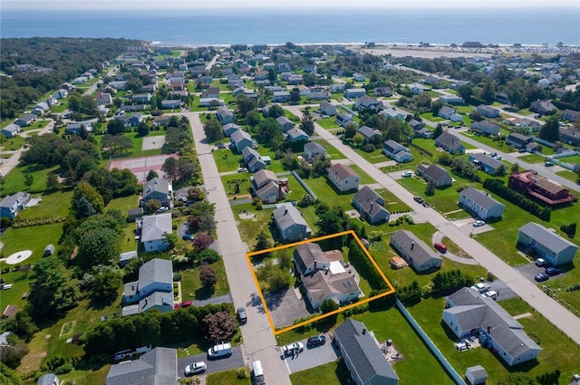 aerial view with a residential view and a water view