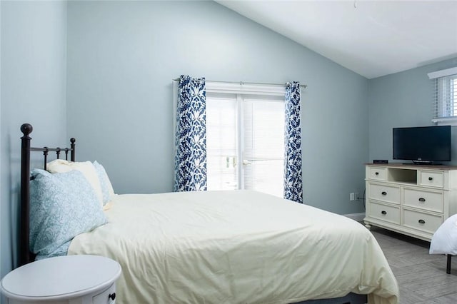 bedroom with vaulted ceiling