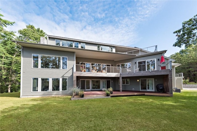 21 Fairview Ave, Hopkinton, RI 02832 - back of property featuring a balcony, a lawn, and a deck