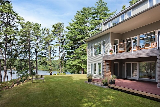21 Fairview Ave, Hopkinton, RI 02832 - view of green lawn featuring a balcony and a deck with water view