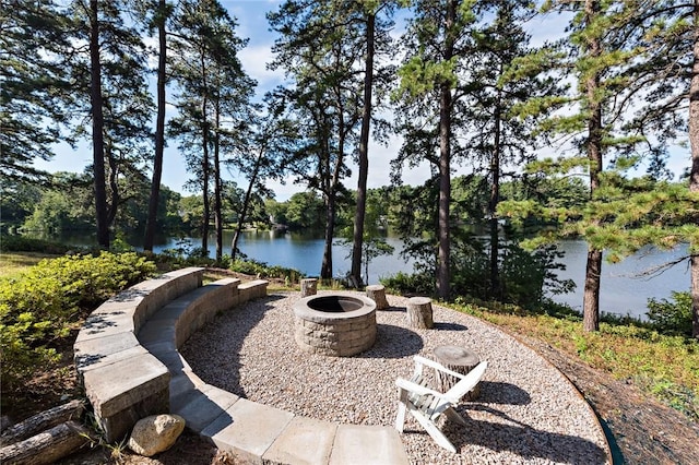 21 Fairview Ave, Hopkinton, RI 02832 - view of patio with an outdoor fire pit and a water view