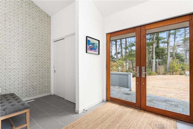 21 Fairview Ave, Hopkinton, RI 02832 - doorway to outside featuring wallpapered walls, french doors, and dark tile patterned floors