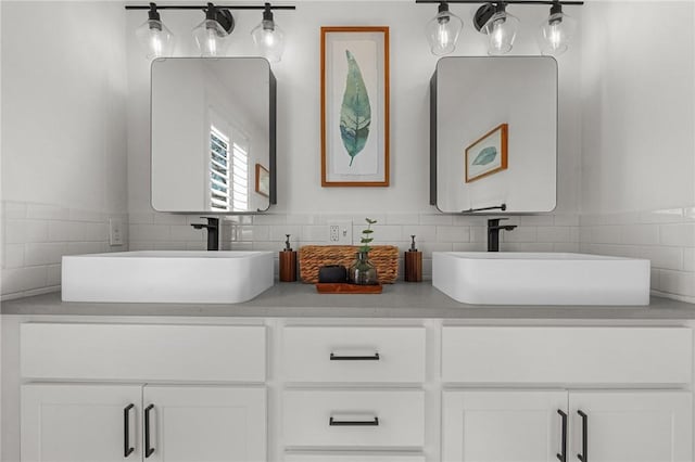 full bath featuring double vanity and a sink