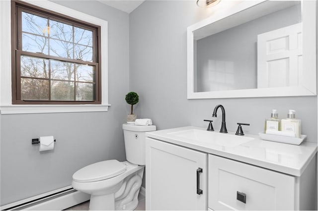 10 Eastgate Dr, Coventry, RI 02816 - bathroom featuring baseboard heating, vanity, and toilet