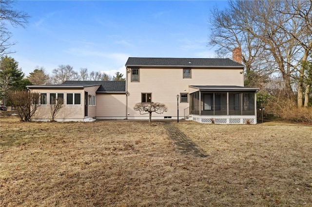 10 Eastgate Dr, Coventry, RI 02816 - rear view of house featuring a chimney, a sunroom, and a yard