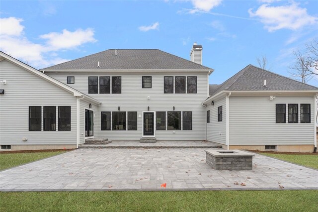 105 Princess Pine Dr, East Greenwich, RI 02818 - back of house with a patio, a yard, a chimney, entry steps, and a fire pit