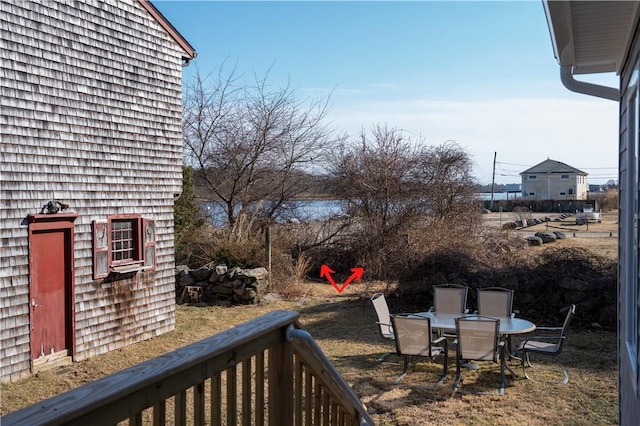 view of yard featuring outdoor dining space