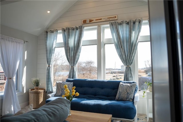 sitting room with recessed lighting and lofted ceiling