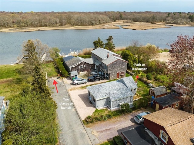 bird's eye view with a water view