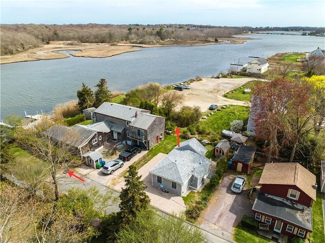 aerial view with a residential view and a water view
