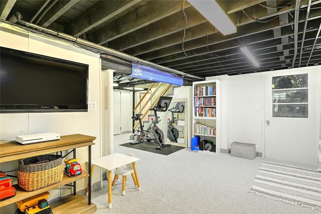 exercise room with carpet floors