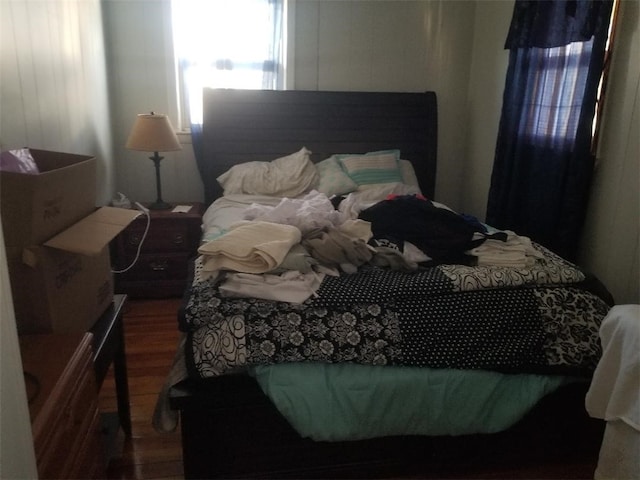 bedroom featuring wood finished floors