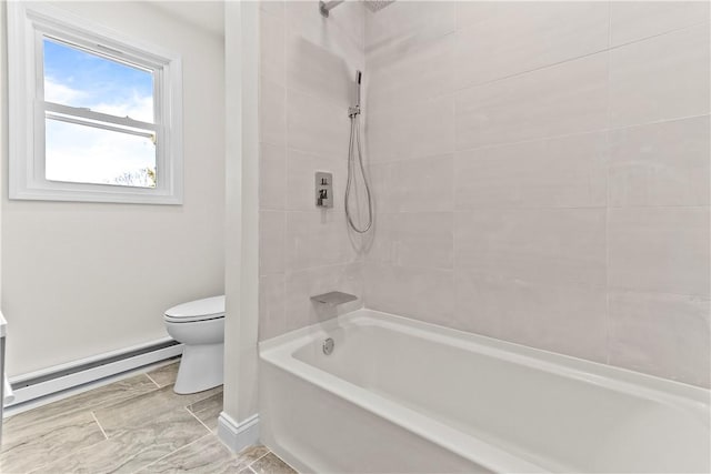 full bathroom featuring a baseboard radiator, toilet, baseboards, and shower / washtub combination
