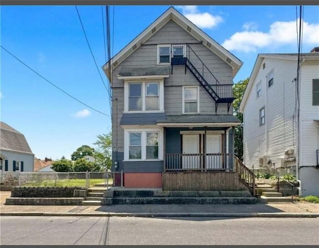 57 School St, East Providence, RI 02914 - view of front of property featuring covered porch and fence