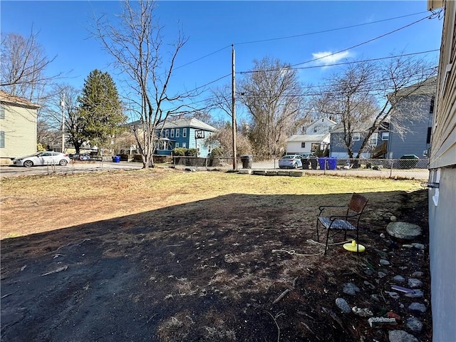 view of yard featuring fence