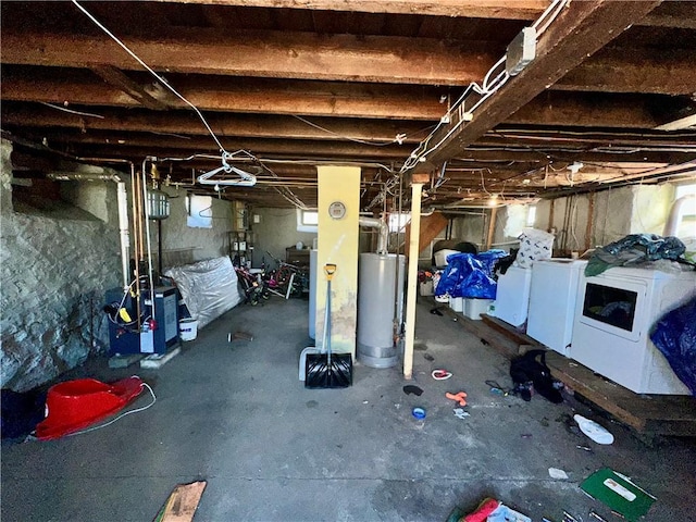 unfinished basement with water heater, separate washer and dryer, and a heating unit