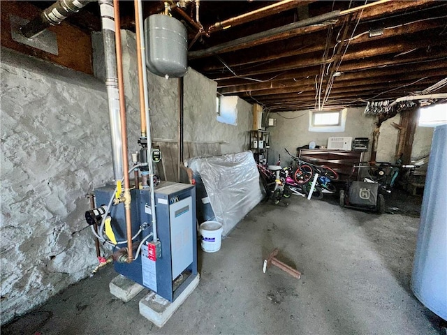 basement featuring a heating unit