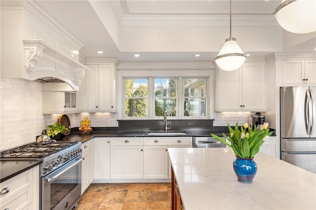 8 Key Ct, Newport, RI 02840 - kitchen with appliances with stainless steel finishes, a sink, backsplash, white cabinets, and dark stone countertops