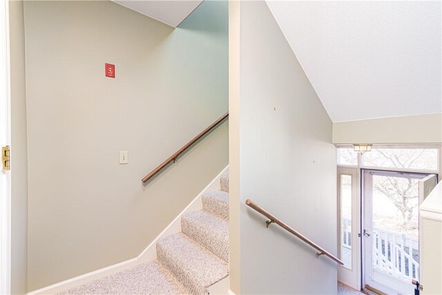 60 Margin St Unit 104, Westerly, RI 02891 - stairway featuring carpet flooring and lofted ceiling
