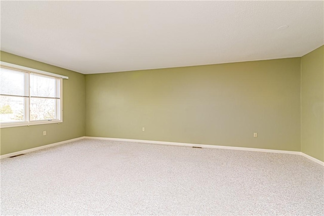 60 Margin St Unit 104, Westerly, RI 02891 - carpeted empty room featuring baseboards