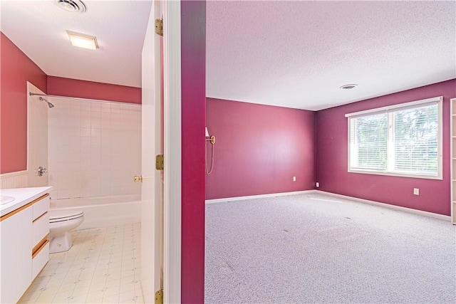60 Margin St Unit 104, Westerly, RI 02891 - empty room with a textured ceiling and light colored carpet
