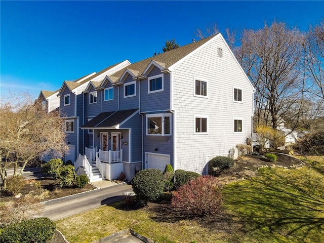 60 Margin St Unit 104, Westerly, RI 02891 - view of front of home with an attached garage