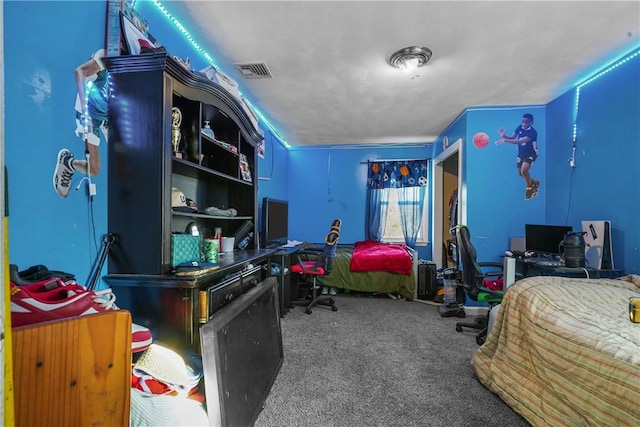 carpeted bedroom with visible vents