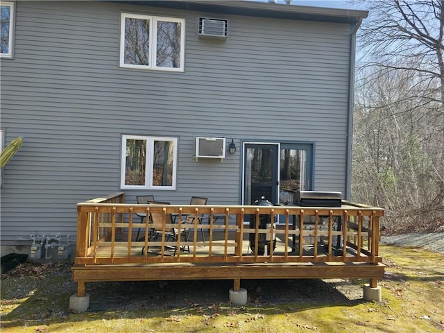 back of property featuring a wooden deck