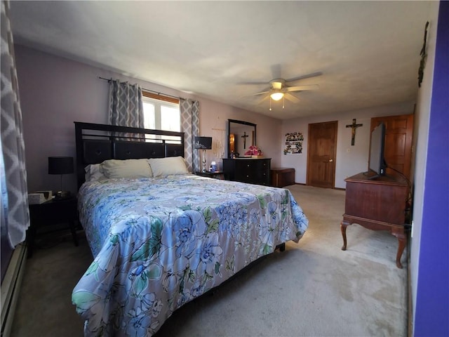 bedroom with carpet floors, ceiling fan, and a baseboard radiator