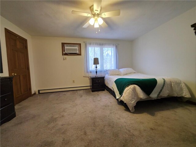 bedroom featuring carpet floors, a baseboard radiator, an AC wall unit, and a ceiling fan