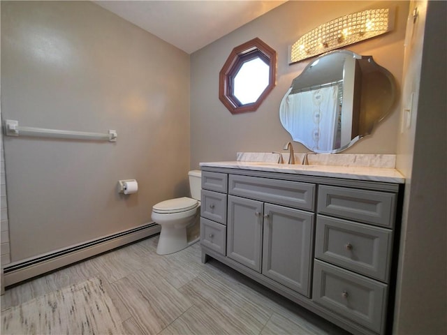 bathroom featuring baseboard heating, toilet, vanity, and a shower with shower curtain