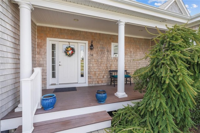 doorway to property featuring a porch