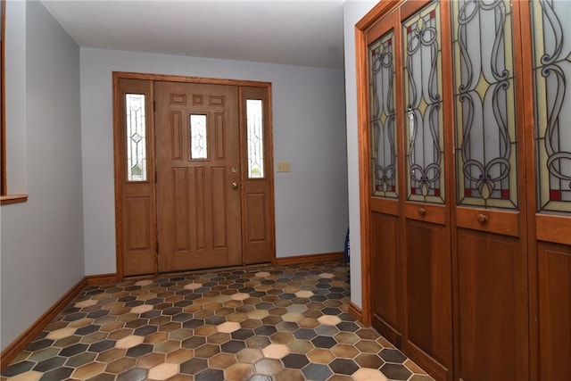 entrance foyer featuring baseboards