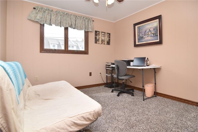 home office with baseboards, carpet floors, ornamental molding, and a ceiling fan