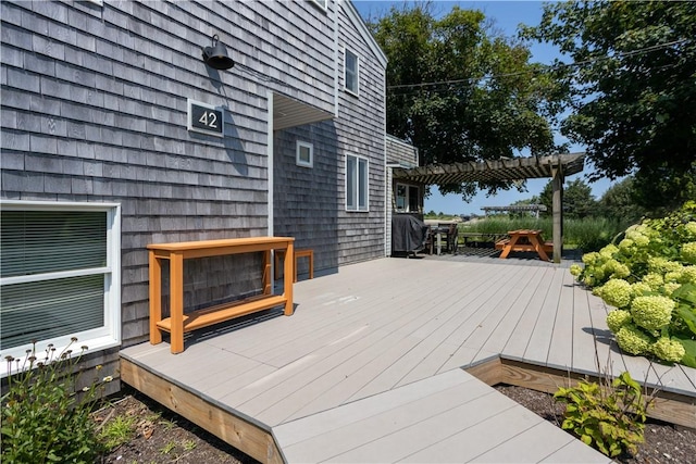 wooden terrace featuring a pergola