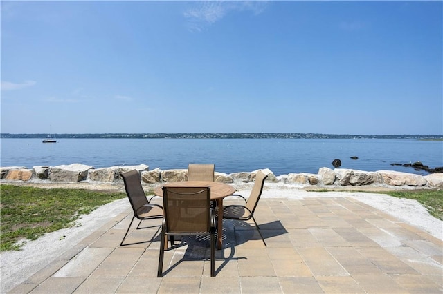 view of patio / terrace featuring a water view