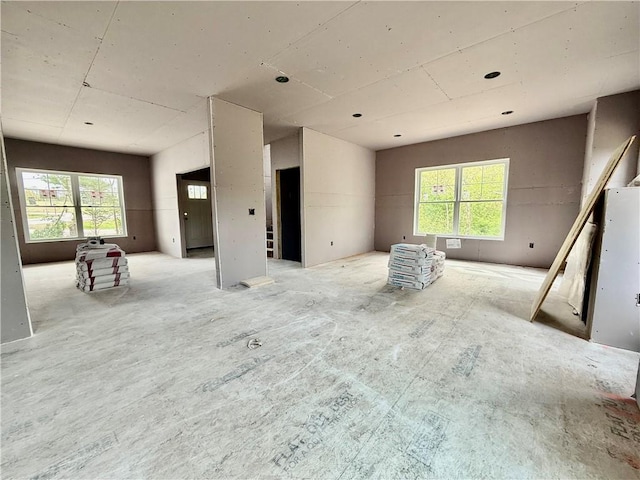 spare room with plenty of natural light