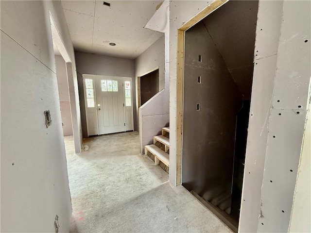mudroom featuring concrete floors