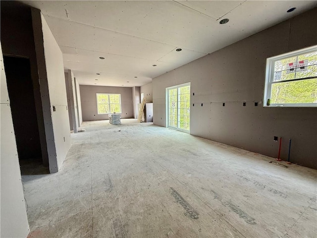 unfurnished room with plenty of natural light