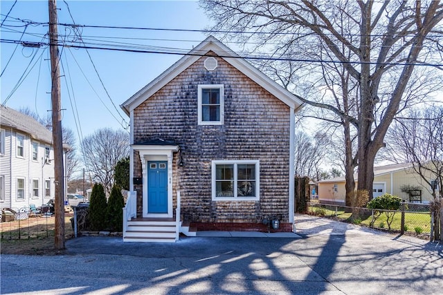 view of front of property with fence