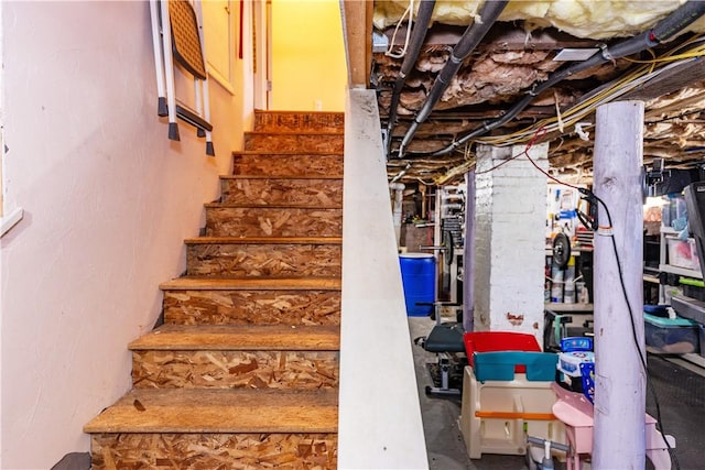 stairs with concrete floors