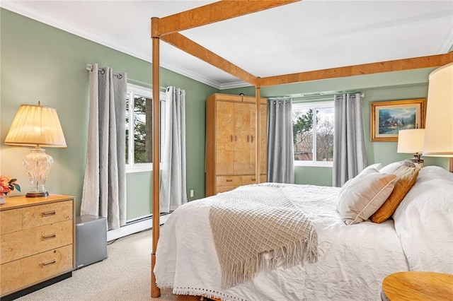 200 Hoffman Ave Unit 405, Cranston, RI 02920 - carpeted bedroom with a baseboard heating unit, multiple windows, and ornamental molding