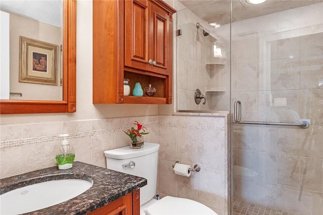 200 Hoffman Ave Unit 405, Cranston, RI 02920 - full bath with vanity, toilet, a shower stall, and tile walls