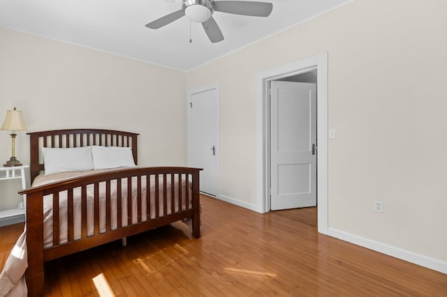 23 Smith Ave Unit 2, Newport, RI 02840 - bedroom with baseboards, a ceiling fan, and hardwood / wood-style flooring