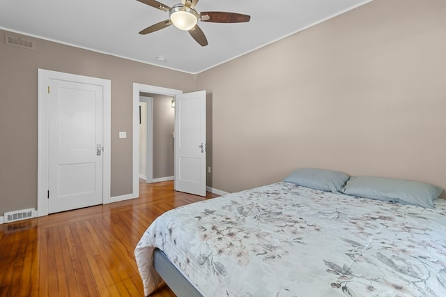 23 Smith Ave Unit 2, Newport, RI 02840 - bedroom featuring baseboards, ceiling fan, wood finished floors, and visible vents