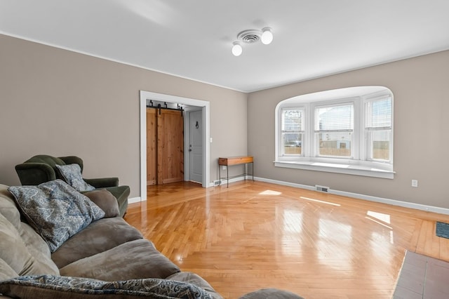 23 Smith Ave Unit 2, Newport, RI 02840 - living area featuring baseboards, a barn door, and visible vents